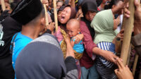 Doni Serang Ratusan Warga Jebol Pagar Saat Antre Paket Sembako Peringatan Muludan di Tanggul Kota Serang 1