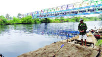 DLH Ambil Sempel Air Sungai Ciujung yang Menghitam